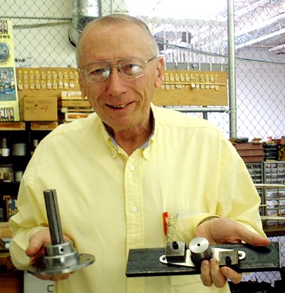 John Lipscomb 
with the propeller hardware he is machining in his shop for our project